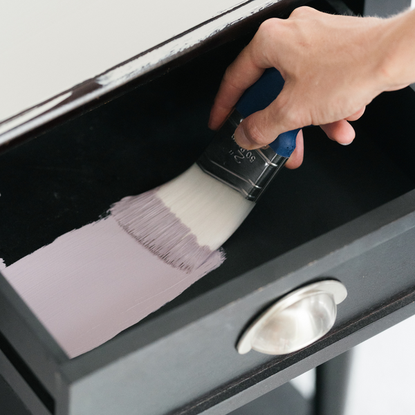 palm flex blue handle brush painting inside a drawer